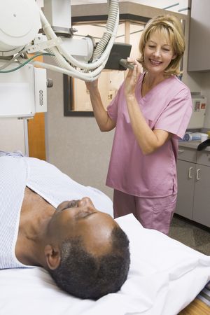 Nurse With Patient Having An X-Rayの写真素材