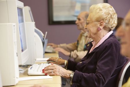 Senior woman using computerの写真素材