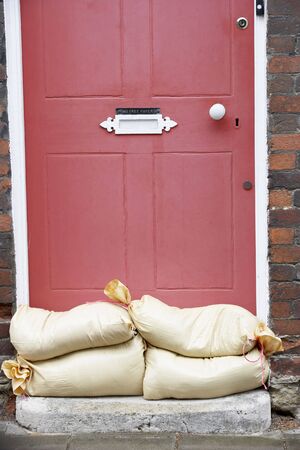 Sandbags Stacked In A Doorway In Preparation For Floodingの写真素材