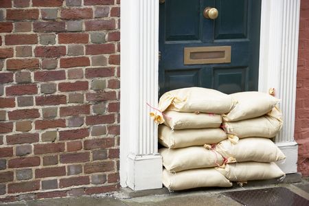 Sandbags Stacked In A Doorway In Preparation For Floodingの写真素材