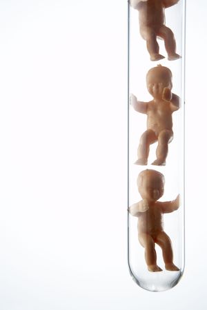 Baby Figurines In Test Tubesの写真素材