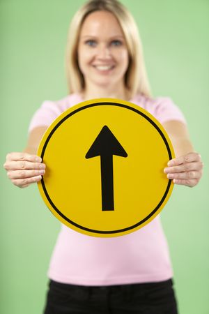 Woman Holding Road Traffic Sign