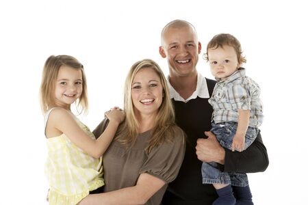 Studio Shot Of Family Group In Studio