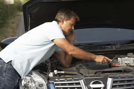 Driver Broken Down On Country Roadの写真素材