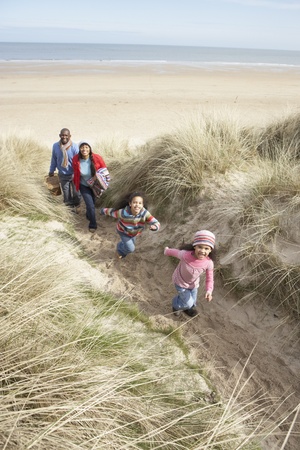 Black Family on a beachの写真素材