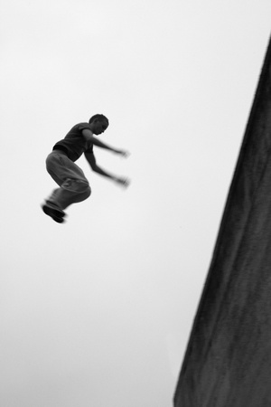 Teenage boy practicing free running