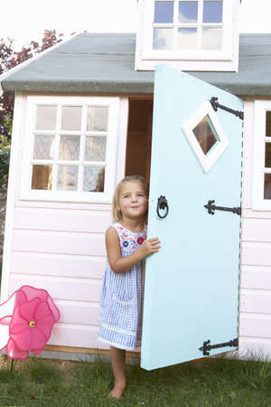 A young girl plays outdoorsの写真素材