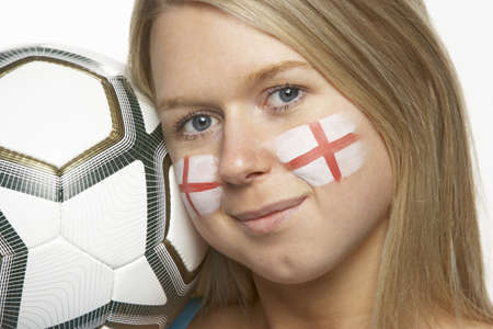 Young Female Football Fan With St Georges Flag Painted On Faceの写真素材