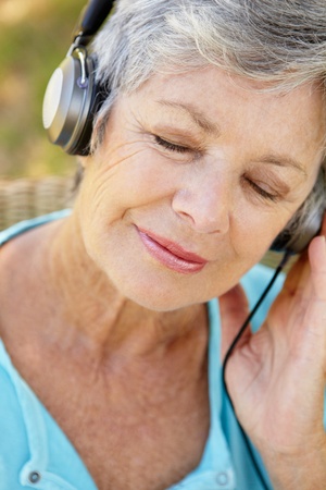Senior woman with headphone