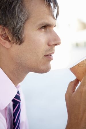Businessman drinking coffeeの写真素材