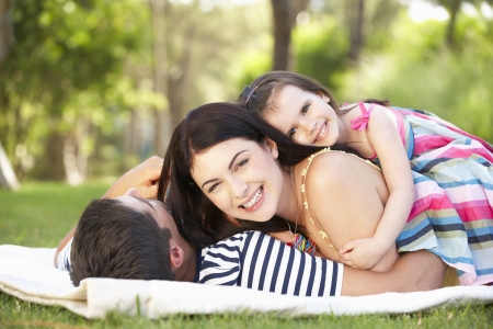 Family Relaxing In Summer Gardenの写真素材