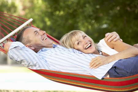 Senior Couple Relaxing In Hammockの写真素材