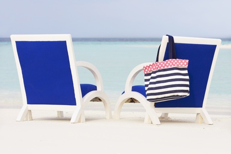 Empty Chairs On Beautiful Tropical Beach