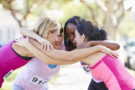 Female Runners Congratulating One Another After Raceの写真素材
