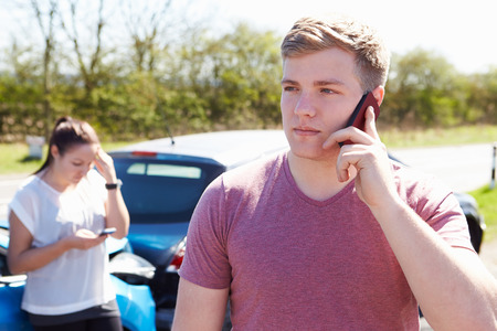 Driver Making Phone Call After Traffic Accident