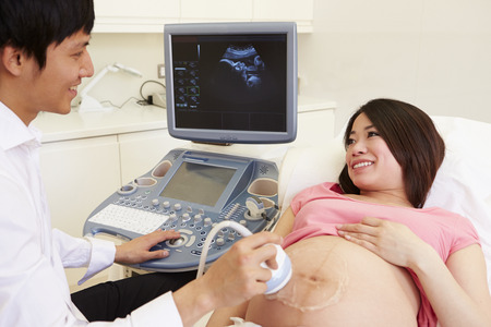 Pregnant Woman Having 4D Ultrasound Scanの写真素材