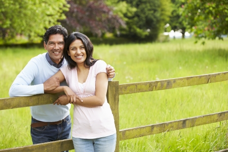 Indian Couple Walking In Countrysideの写真素材