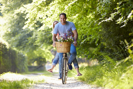 Couple On Cycle Ride In Countrysideの写真素材