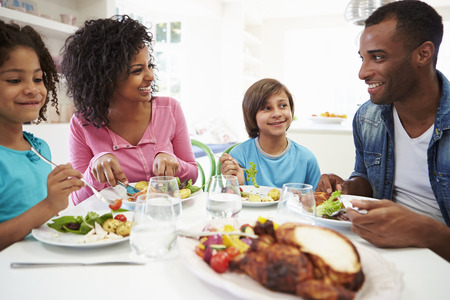 African American Family Eating Meal At Home Togetherの写真素材