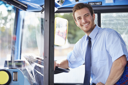 Portrait Of Bus Driver Behind Wheelの写真素材