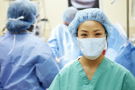 Portrait Of Nurse Working In Operating Theatreの写真素材