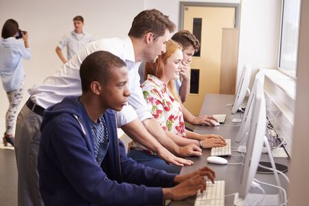 College Students Using Computers On Media Studies Courseの写真素材