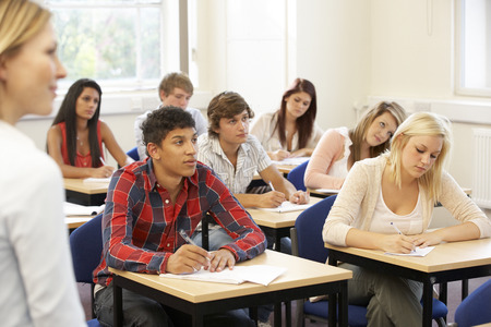 Students and tutor in classの写真素材