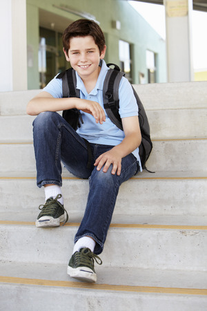 Pre teen boy at schoolの写真素材