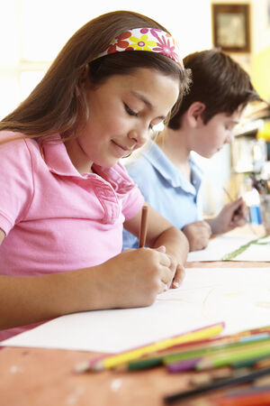 Pre teen children in art classの写真素材