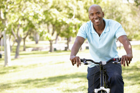 Young  man cycling in park