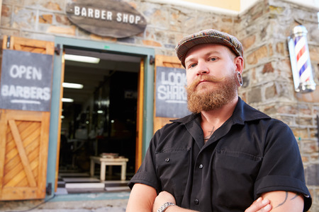 Portrait Of Hipster Barber Standing Outside Shopの写真素材