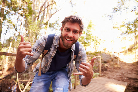 Man On Walk Making Funny Gesture At Cameraの写真素材