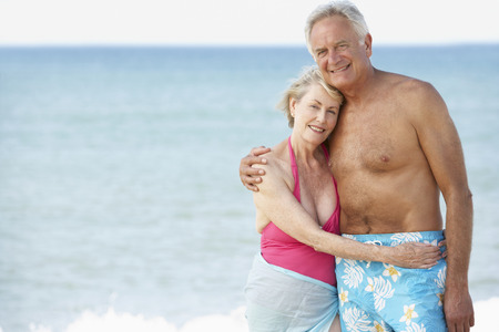 Senior Couple Enjoying Beach Holidayの写真素材