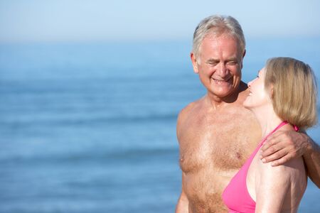 Senior Couple Enjoying Beach Holidayの写真素材