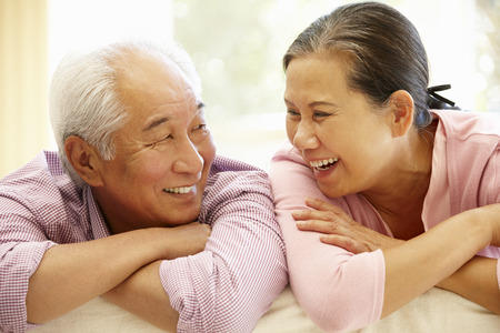 Senior Asian couple at homeの写真素材