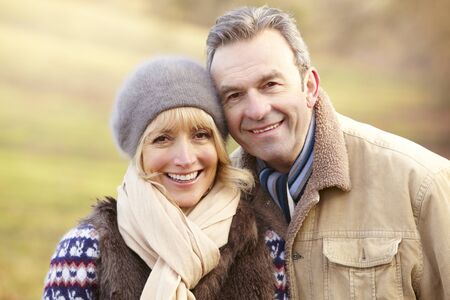 Portrait senior couple outdoors in winter