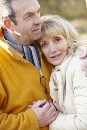 Senior couple portrait outdoors in winter