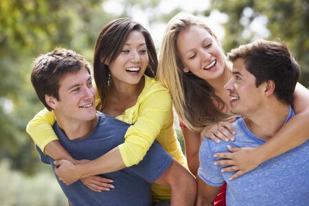 Group Of Young Friends Having Fun In The Countryside