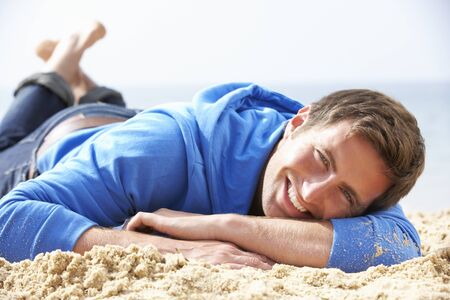 Man Relaxing On Beachの写真素材