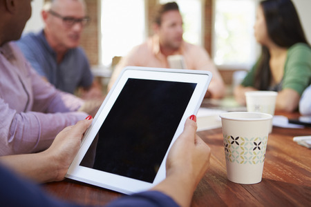 Businessman Using Digital Tablet In Meetingの写真素材