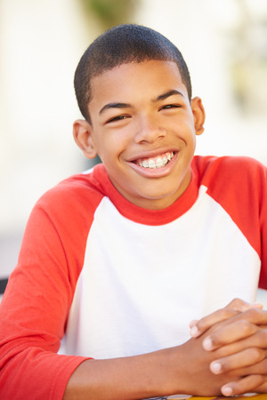 Portrait Of Smiling Teenage Boyの写真素材
