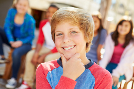 Group Of Children Hanging Out Together In Mall