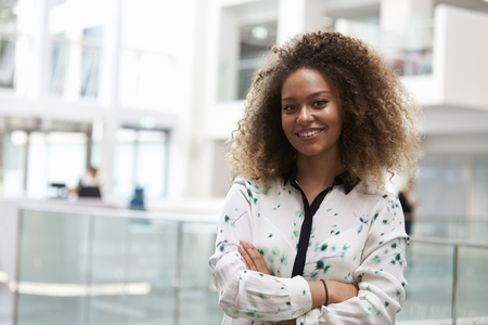 Head And Shoulders Portrait Of Young Businesswoman In Officeの写真素材