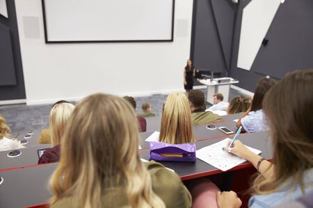 Lecture at university lecture theatre, audience POV, closerの写真素材