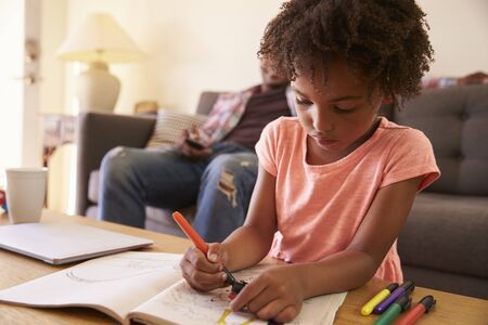 Father Watches TV As Daughter Colors In Picture Book