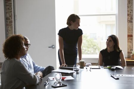 Group Of Businesspeople Meeting In Modern Boardroomの写真素材