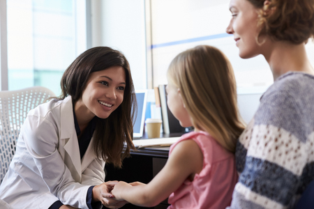 Pediatrician Meeting With Mother And Child In Hospitalの写真素材