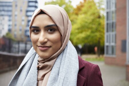Portrait Of British Muslim Woman In Urban Environmentの写真素材