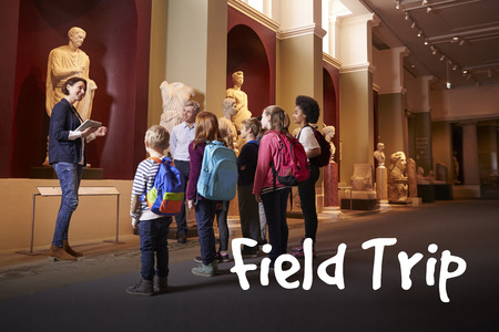 Pupils And Teacher On School Field Trip To Museum With Guideの写真素材