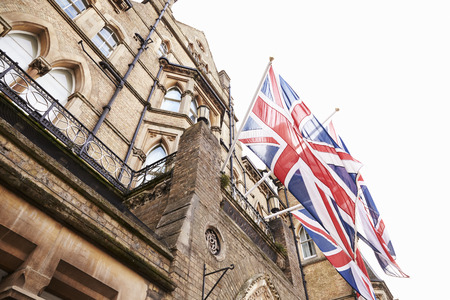 OXFORD/ UK- OCTOBER 26 2016: Union Jack Flags Outside Randolph Hotel In Oxfordのeditorial素材
